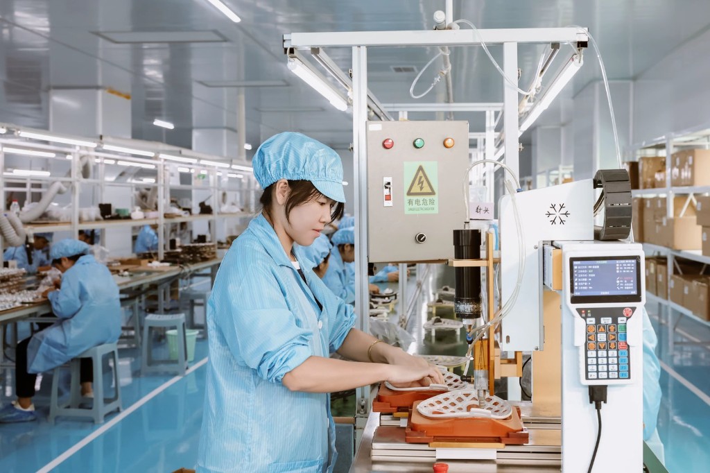 Quality control station for LED face mask manufacturing
